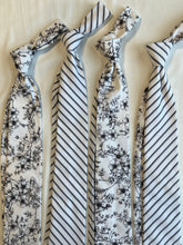 Load image into Gallery viewer, Men’s Necktie in Black and White Floral and Stripe
