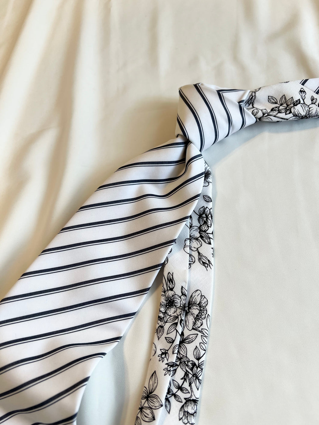 Men’s Necktie in Black and White Floral and Stripe