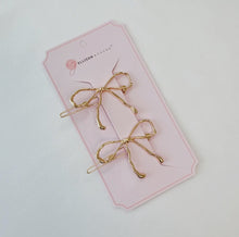 Load image into Gallery viewer, Set of 2 Wobbly Gold Metal Bow Barrette Clips
