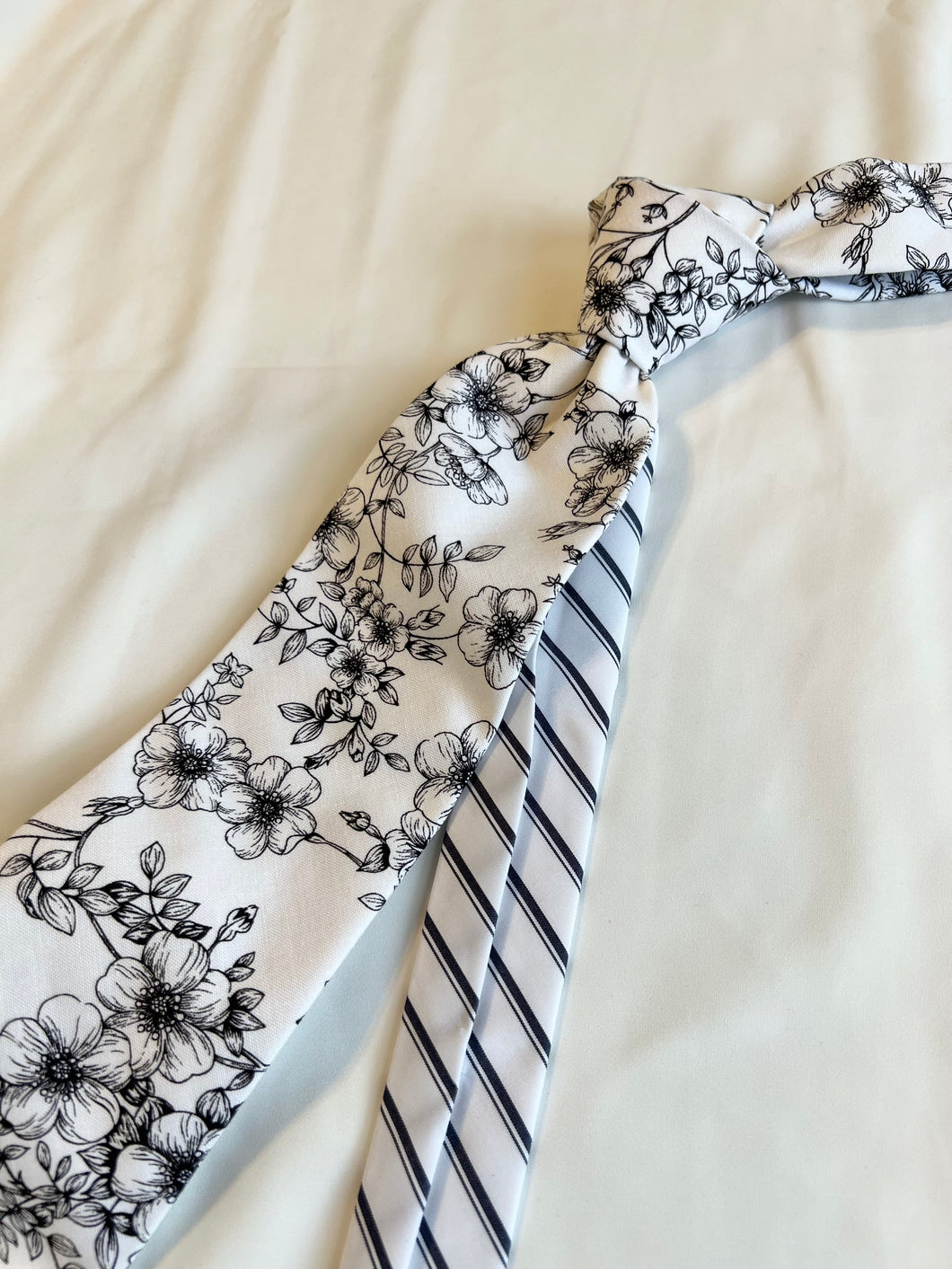 Men’s Necktie in Black and White Floral and Stripe